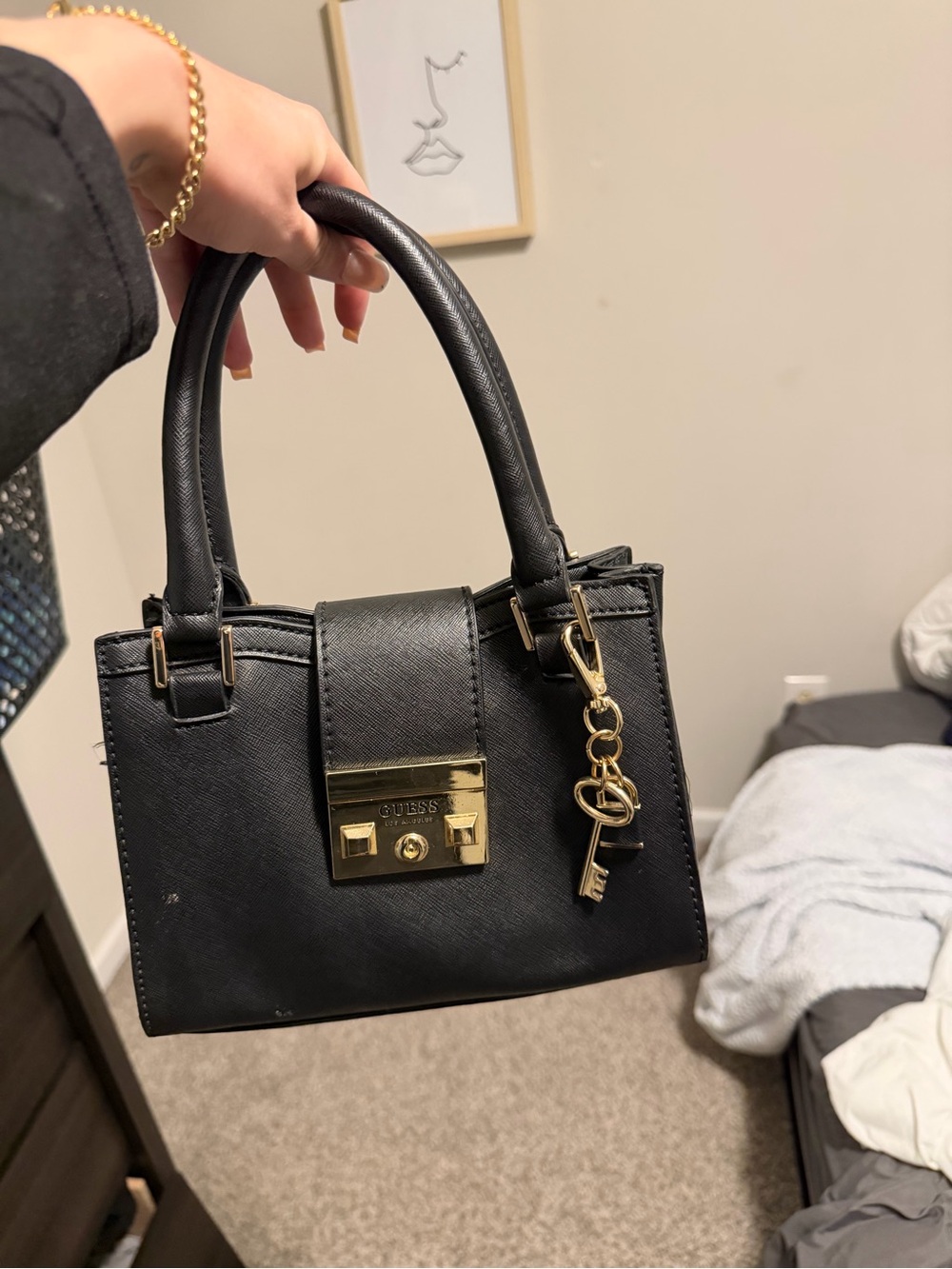 GUESS Black Satchel with Gold Hardware and Key Charm